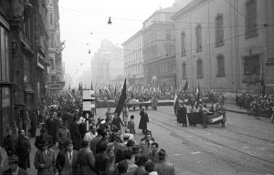 Hungarian freedom fighters and protestors march on Kossuth Square near Parliament in Budapest, Oct. 25, 1956.