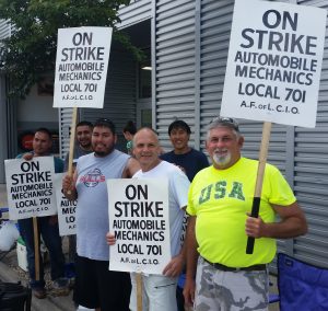 Auto mechanics on strike, picket line in Evanston, Ill., Aug. 14, 2017. Photo for News & Letters by Franklin Dmitryev.